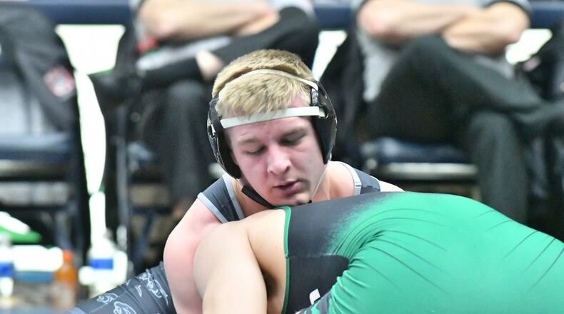 Springboro senior Jacob Kowalski beat Mason junior Owen Amburgy 3-2 to win the 195-pound weight class for the Panthers’ lone individual title. Greg Billing / Contributed
