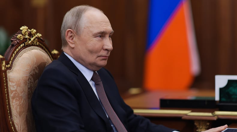 Russian President Vladimir Putin attends a meeting with Nizhny Novgorod Region Governor Gleb Nikitin at the Kremlin, in , Russia, Friday, March 6, 2026. (Gavriil Grigorov, Sputnik, Kremlin Pool Photo via AP)