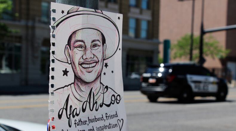 FILE - A makeshift memorial for Arthur Folasa Ah Loo, known to friends and family as Afa, is seen, June 17, 2025, in downtown Salt Lake City, on the block where Ah Loo was fatally shot during a "No Kings" protest on Saturday, June 14. (AP Photo/Hannah Schoenbaum, file)