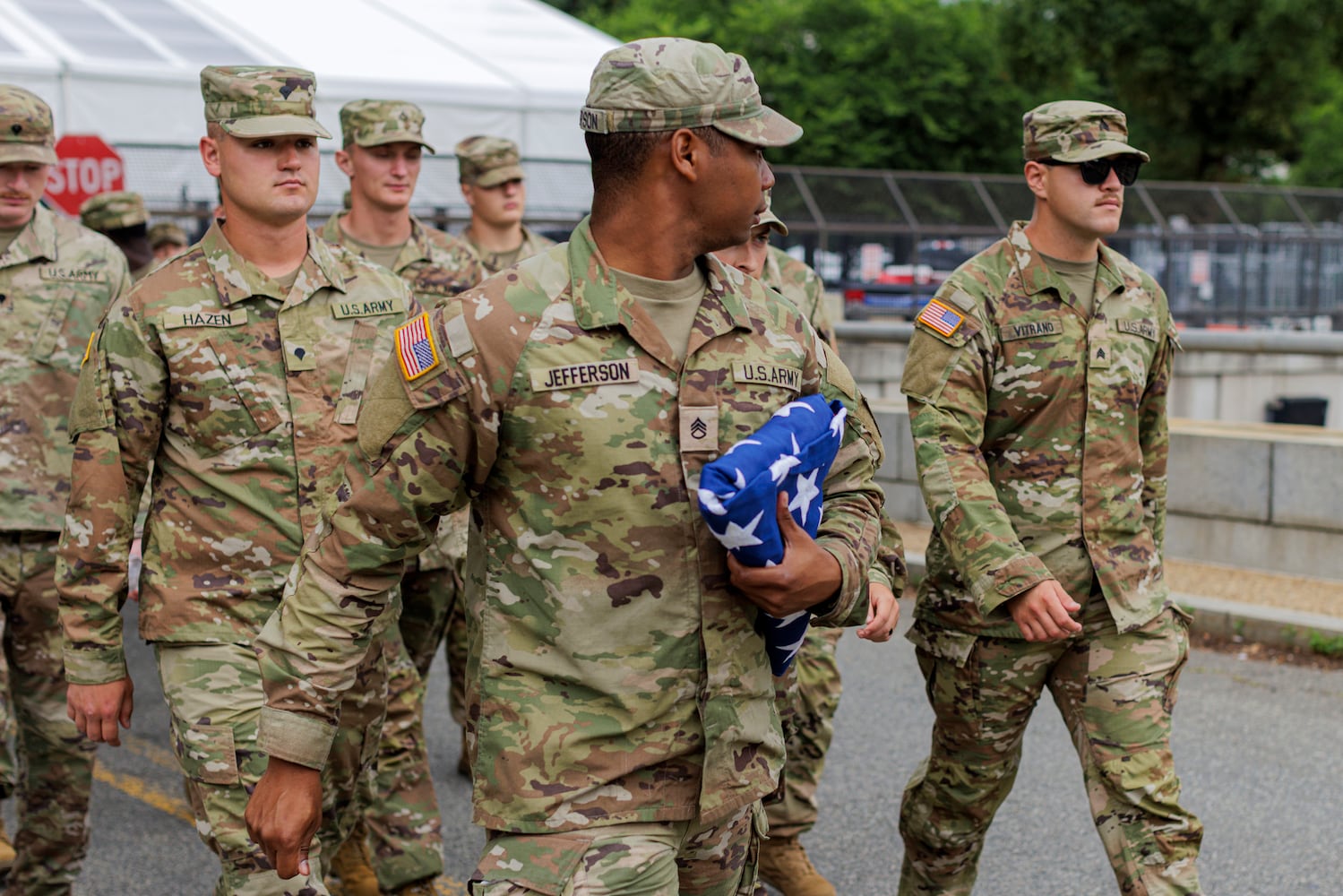 U.S. Army soldiers march outside the Department of Agriculture ahead of a parade commemorating the Army's 250th anniversary in Washington on Saturday, June 14, 2025. (Jason Andrew/The New York Times) 