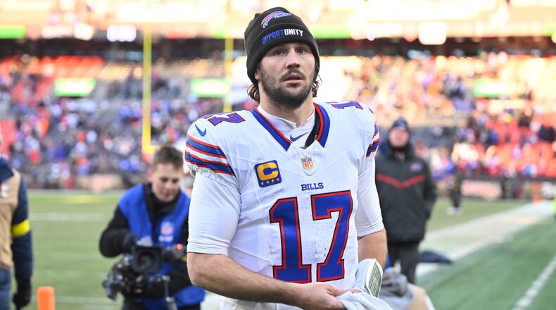 Buffalo Bills quarterback Josh Allen (17) leave the field after an NFL football game against the Cleveland Browns in Cleveland, Sunday, Dec. 21, 2025. (AP Photo/David Richard)