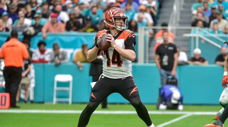 MIAMI, FLORIDA - DECEMBER 22: Andy Dalton #14 of the Cincinnati Bengals drops back to pass in the second half against the Miami Dolphins at Hard Rock Stadium on December 22, 2019 in Miami, Florida. (Photo by Eric Espada/Getty Images)