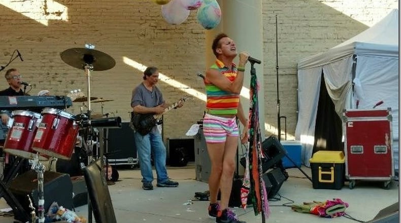 Menus singer Tim Goldrainer always keeps the performance colorful. CONTRIBUTED