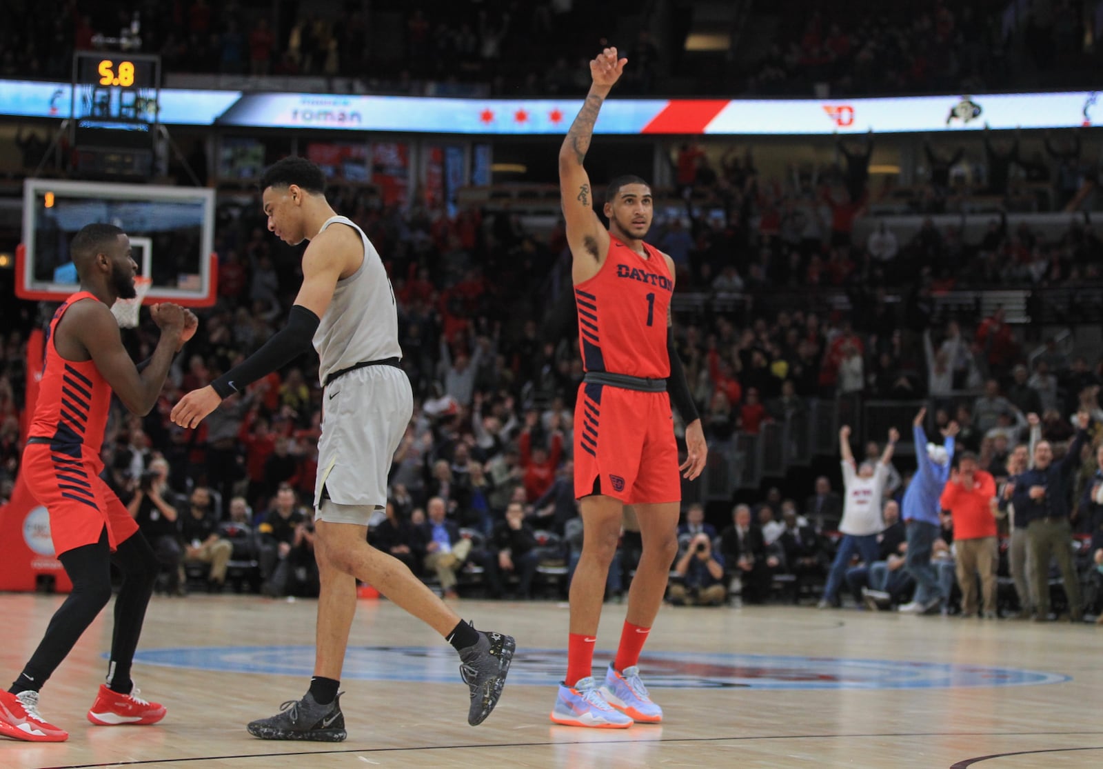 Dayton's Obi Toppin reacts after making a game-tying 3-pointer against Colorado on Saturday, Dec. 21, 2019, at the United Center in Chicago.