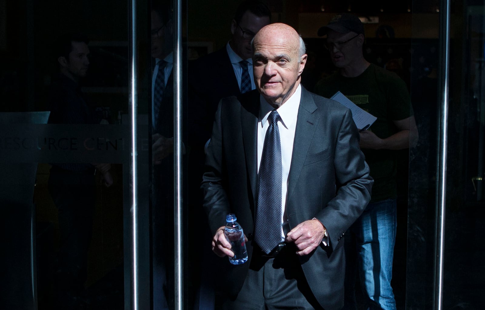 FILE - In this Sept. 22, 2016, file photo, Lou Lamoriello leaves an NHL hockey news conference in Toronto. (Chris Young/The Canadian Press via AP, File)