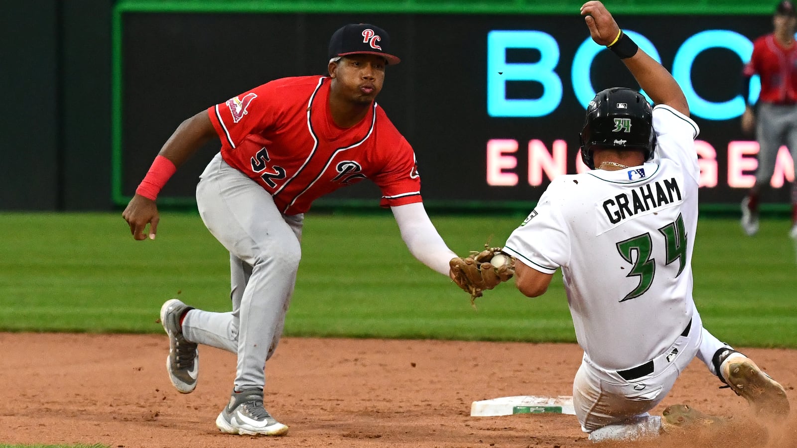 The Dragons were aggressive on the bases and Carter Graham is out trying to take second base on a ball that bounced away from the catcher Wednesday night at Day Air Ballpark. JEFF GILBERT/CONTRIBUTED