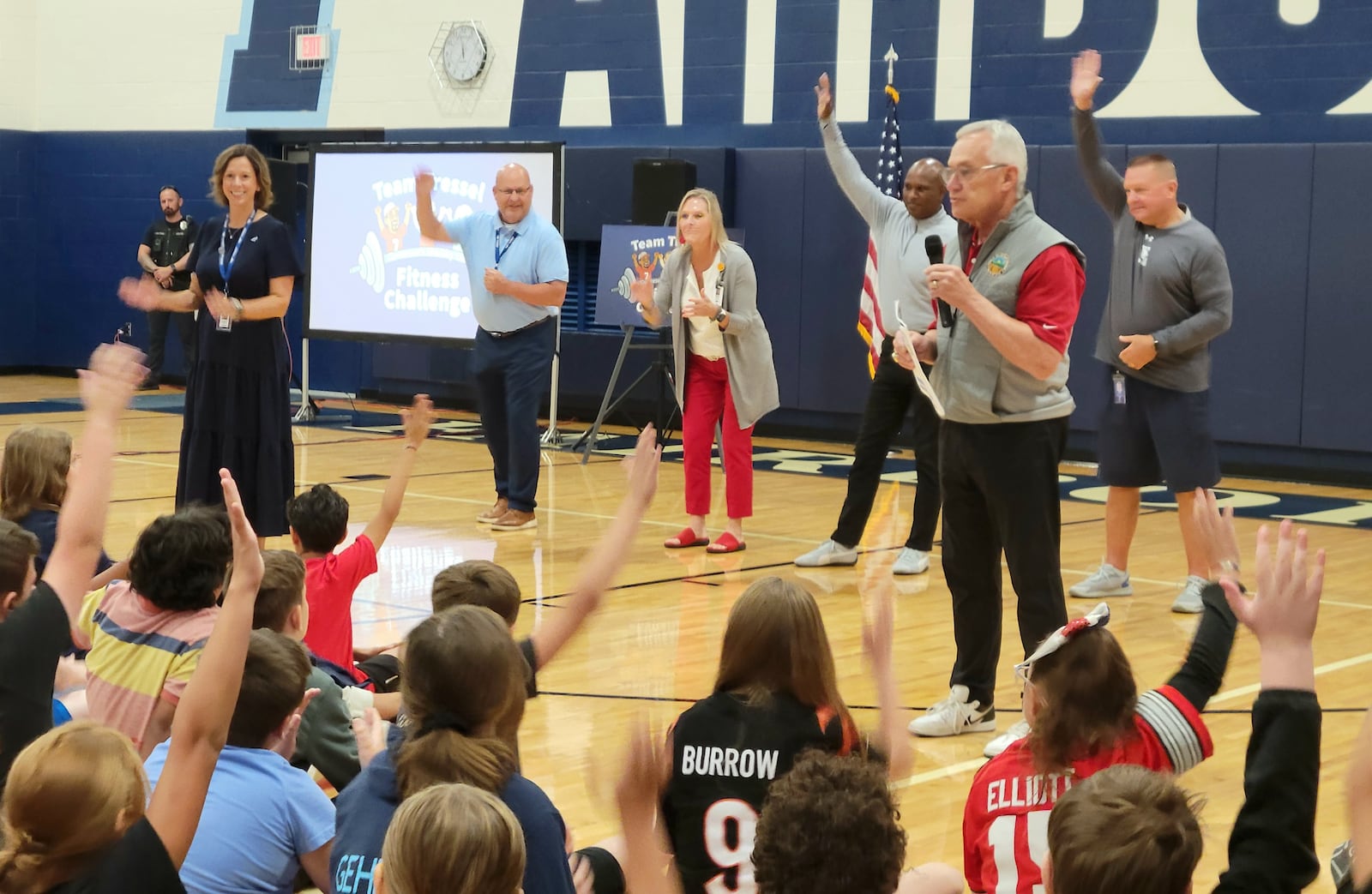 Lt. Gov. Jim Tressel (right) leads a focus exercise with Fairborn Intermediate School students and staff, Aug. 27, 2025. LONDON BISHOP/STAFF