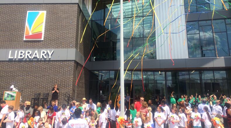 A photo of the grand opening of the new main Dayton Metro Library in downtown. CORNELIUS FROLIK / STAFF