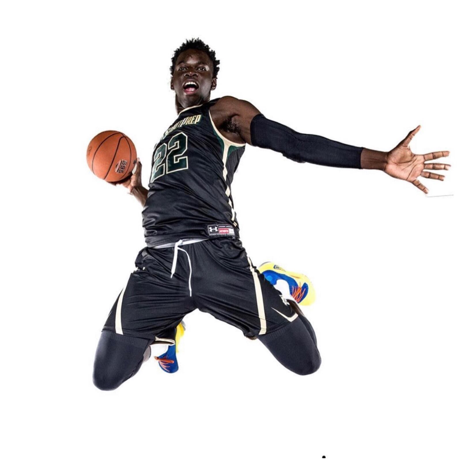 Ibrahima Jarjou  flying through the air, ready to dunk, when he was a high school senior at Holy Spirit Prep in Atlanta(Contributed Photo)