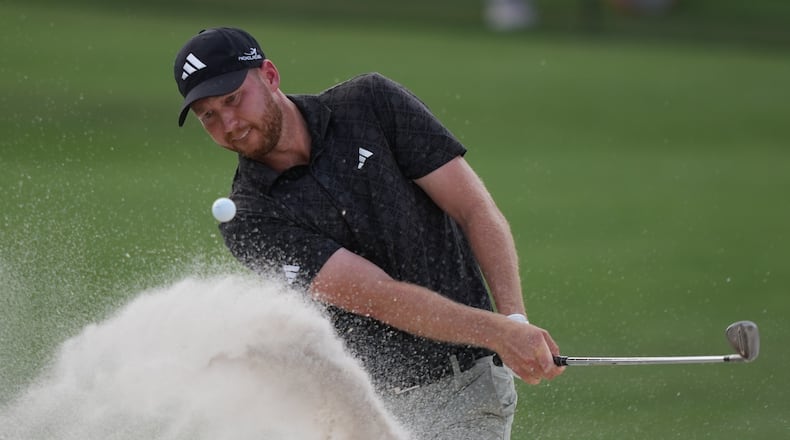 Daniel Berger hits out of a bunker on the second hole during the third round of the Arnold Palmer Invitational at Bay Hill golf tournament Saturday, March 7, 2026, in Orlando, Fla. (AP Photo/Matt Slocum)