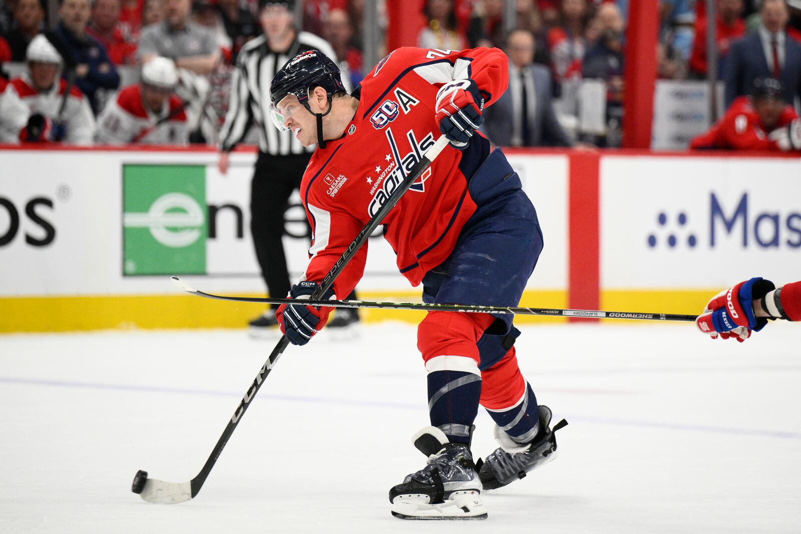 Washington Capitals defenseman John Carlson (74) shoots the puck in the first period of Game 2 of a first-round NHL hockey playoff series against the Montreal Canadiens Wednesday, April 23, 2025, in Washington. (AP Photo/Nick Wass)