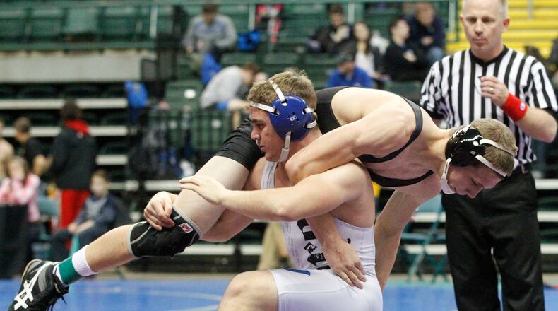 Springboro's Joe Kylin lifts Northmont's Sam Wilcox during their 148-pound rat tail match Friday, December 28, at the beginning of the 2012 Greater Miami Valley Wrestling Association Holiday Tournament at Wright State University's Nutter Center.