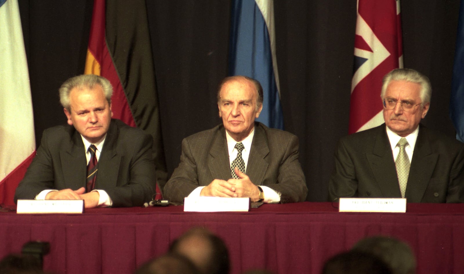 President of the Federal Republic of Yugoslavia Slobodan Miloševic, left,  President of Bosnia and Herzegovina Alija Izetbegovic and  President of Croatia Franjo Tudman at the signing of the Dayton Agreement of the Bosnia Peace Accord in Fairborn on Nov. 212, 1995. 
© 1995 Skip Peterson/Dayton Daily News