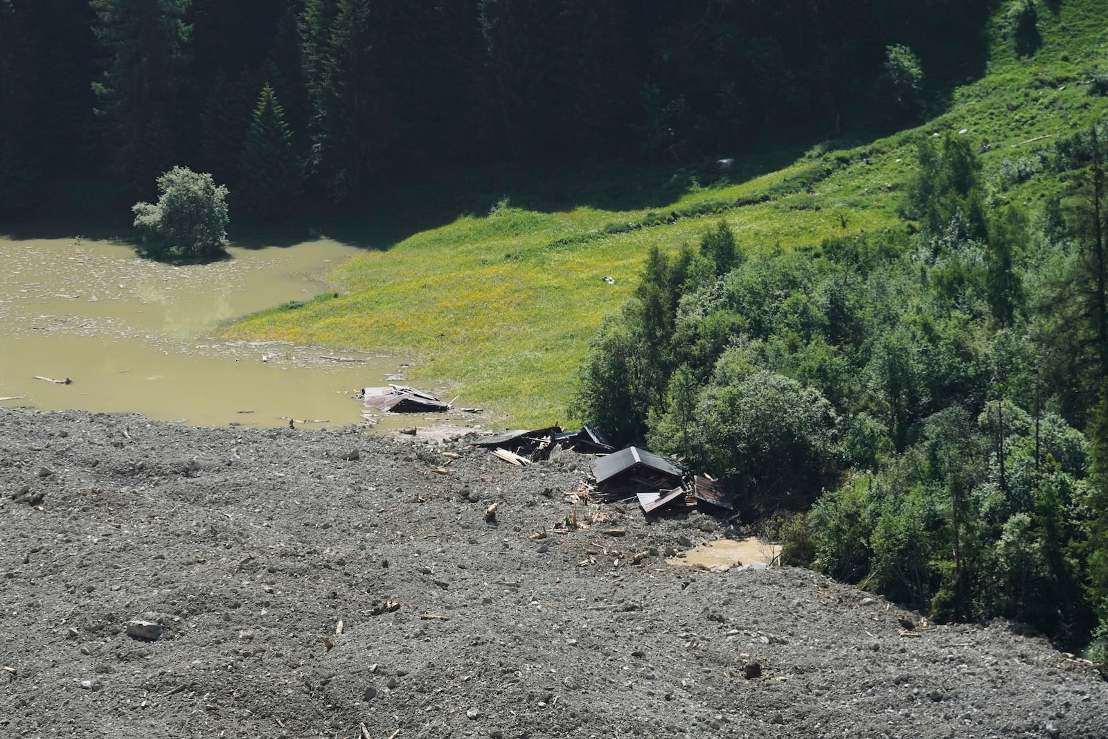 The aftermath of the Birch Glacier collapse is visible in Blatten, Switzerland, June 11, 2025. (AP Photo/Matthias Schrader)