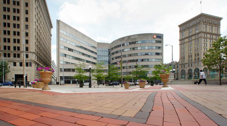 The Dayton Area Chamber of Commerce will move to the former PNC Building (center) at Third and Main streets. CHRIS STEWART / STAFF