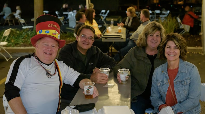 Prost! Oktoberfest featuring a German American Day Celebration was held at the Dayton Liederkranz-Turner German Club in Dayton's St. Anne's Hill Historic District on Saturday, October 3, 2020. Due to the coronavirus pandemic, German food and beer were enjoyed by attendees in a tent with socially distanced tables instead of inside the club as has been in past years. Food, beer and merchandise could also be ordered to go onsite or online via the club's Square site. Did we spot you at the Kranz during Oktoberfest? TOM GILLIAM/CONTRIBUTING PHOTOGRAPHER
