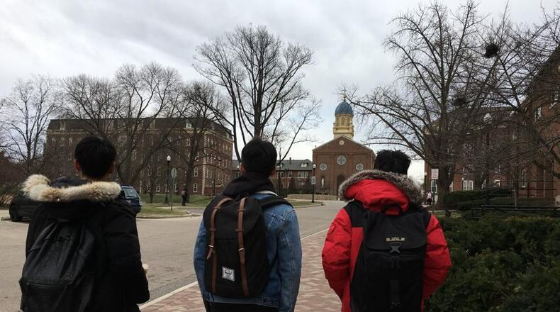 Students walk to classes on the University of Dayton campus in late January. Staff photo / Sarah Franks