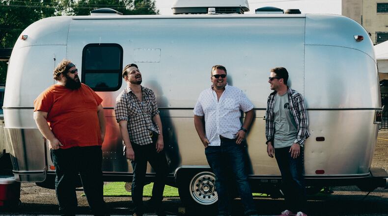 Roots rockers the New Old-Fashioned, (left to right) Tom Blackbern, David Payne, Kent Montgomery and Matt Oliver, celebrate the 10th anniversary of the release of its self-titled debut at Yellow Cab Tavern in Dayton on Saturday, Dec. 3.
