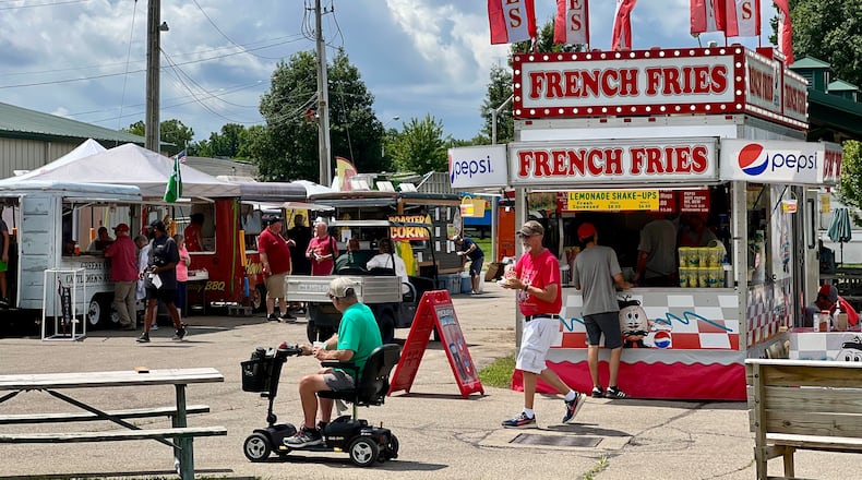 The Greene County Fair was off to a muggy start on Sunday, with temperatures in the mid-80s and humidity levels just as steep. AIMEE HANCOCK/STAFF