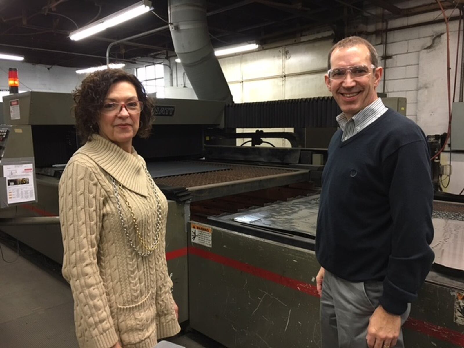 Angelia Erbaugh, president of the Dayton Region Manufacturers Association, and Jim Bowman, chief operating officer at Moraine’s Rack Processing Co. Inc., in a 2020 photo.  THOMAS GNAU/STAF