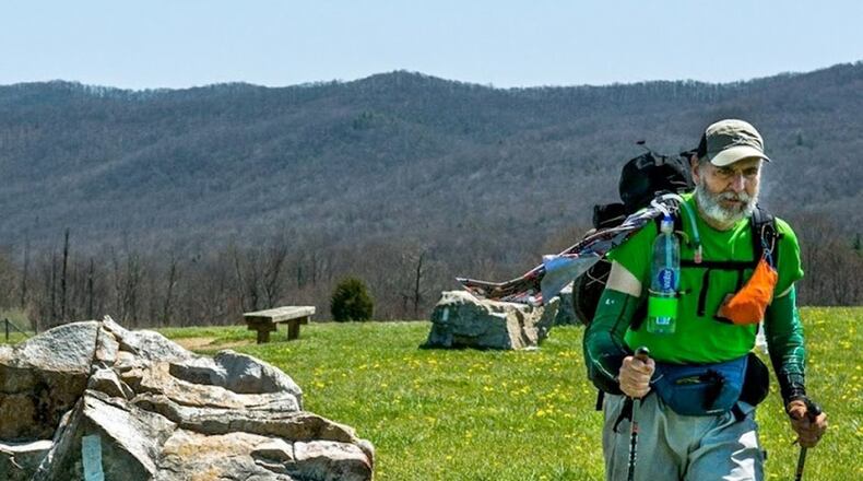 Behrens hiking through fields of huge rocks. CONTRIBUTED.