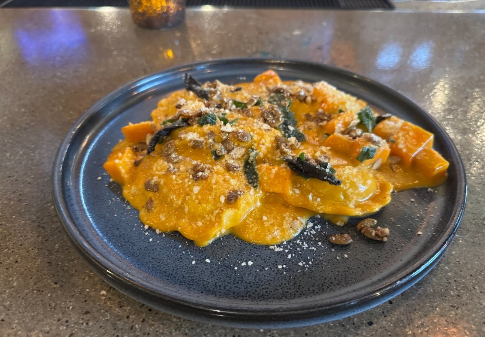 Cozy's Café and Pub's new fall Jumbo Cheese Ravioli in Pumpkin Cream Sauce pairs a familiar pasta with a pumpkin cream sauce, roasted squash direct from a local farm and spiced pepitas for a little crunch. NINA WEIERMAN/CONTRIBUTED