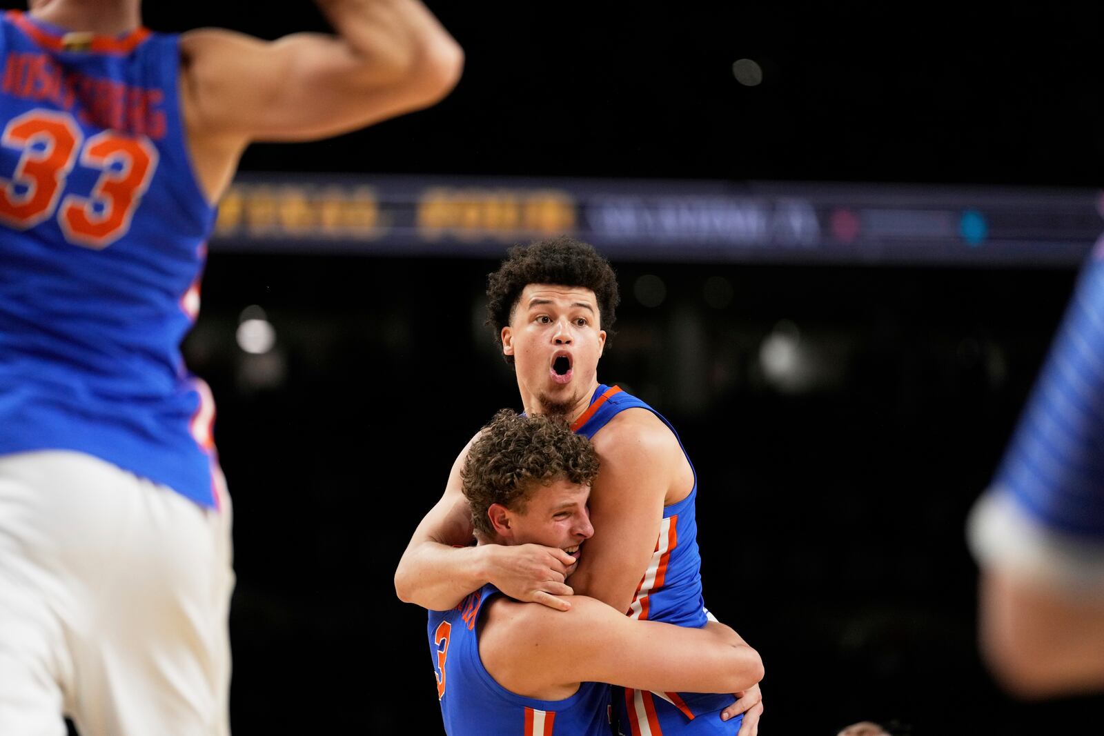 Florida guard Walter Clayton Jr. and center Micah Handlogten celebrates after their win against the Houston in the national championship at the Final Four of the NCAA college basketball tournament, Monday, April 7, 2025, in San Antonio. (AP Photo/Brynn Anderson)