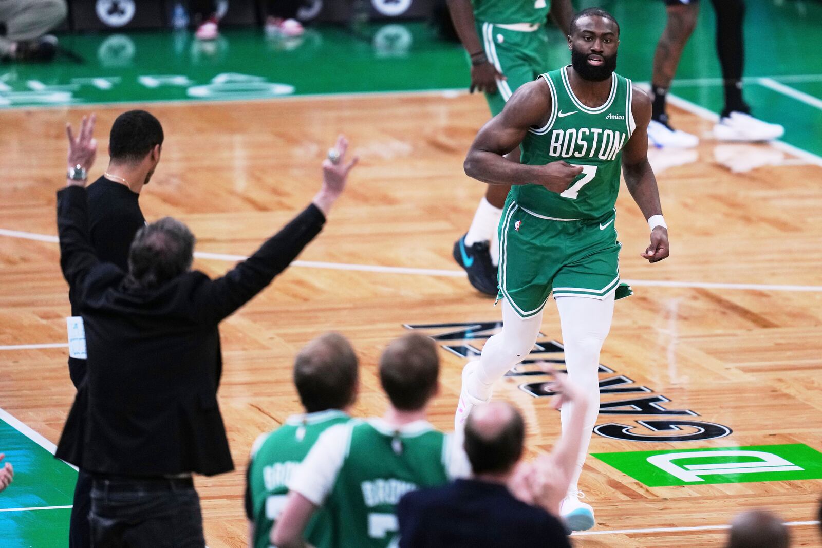 Boston Celtics guard Jaylen Brown (7) celebrates after hitting a 3-pointer against the Orlando Magic during the second half in game 2 of a first-round NBA playoff basketball series, Wednesday, April 23, 2025, in Boston. (AP Photo/Charles Krupa)