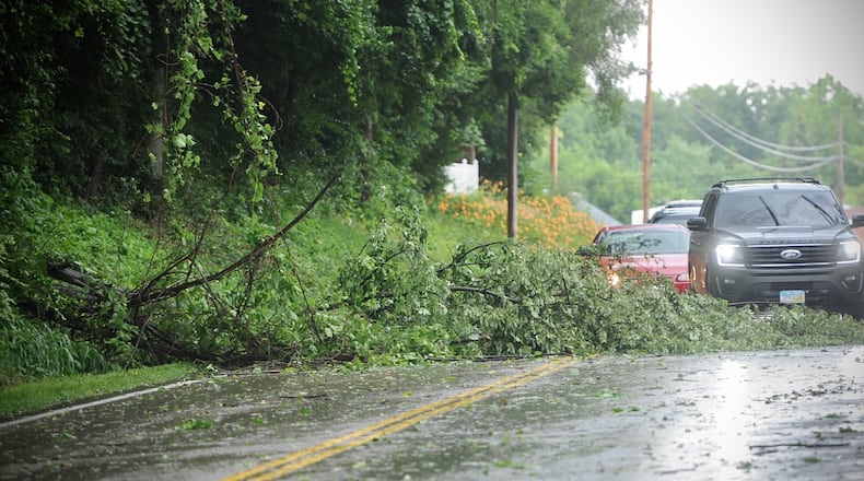 Heavy rain and strong winds hit the Fairborn area Tuesday afternoon causing branches to come down. MARSHALL GORBY\STAFF