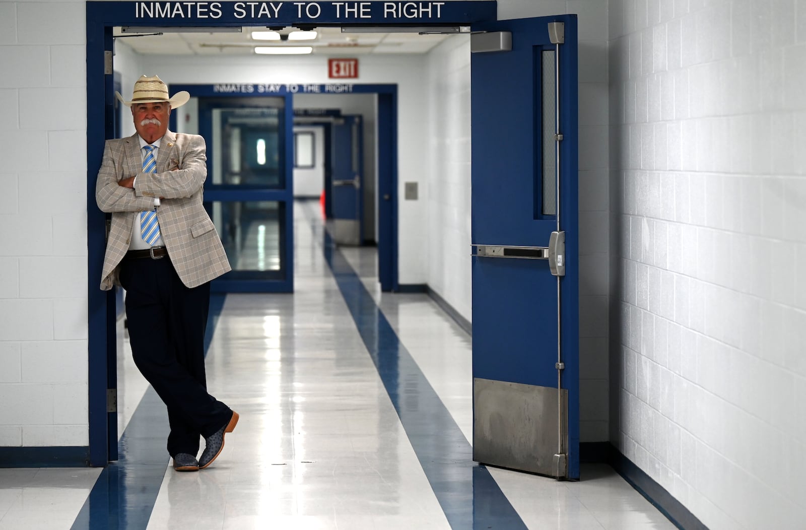 Butler County Sheriff Richard Jones has taken a hard stance on immigration since taking office more than two decades ago. He had 10 deputies credentialed to serve as ICE agents in the county, and said he plans to have more deputies eventually go through the training. Pictured is Jones in the hallway of the Butler County Jail on Wednesday, June 9, 2025. MICHAEL D. PITMAN/STAFF
