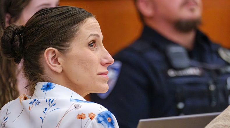 Defendant Kouri Richins, left, accused of poisoning her husband in March 2022, listens to closing arguments in Third District Court, Monday, March 16, 2026, in Park City, Utah. (David Jackson/Pool Photo via AP)