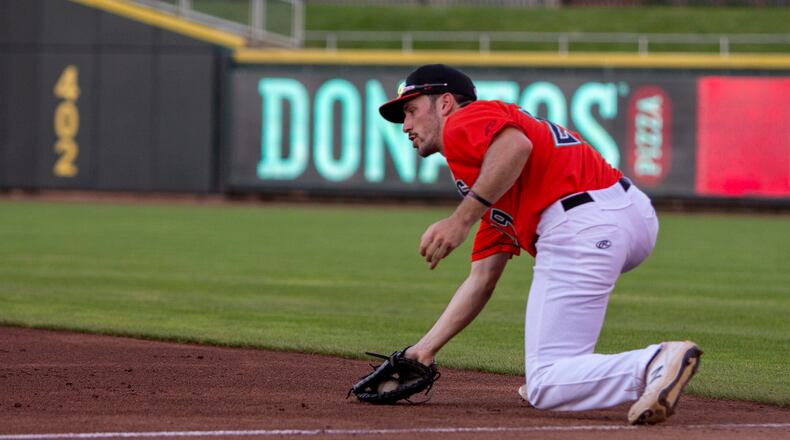 Dayton first baseman Alex McGarry fields a ground ball during a recent game. Jeff Gilbert/CONTRIBUTED