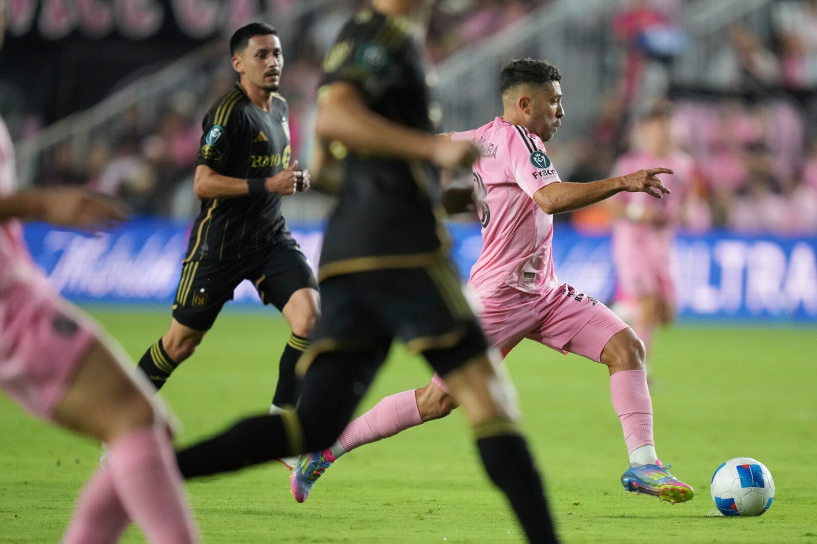 Inter Miami defender Jordi Alba (18) brings the ball up the field against the Los Angeles FC during the first half of a CONCACAF Nations League Quarterfinal Match at Chase Stadium, Wednesday, April 9, 2025 in Fort Lauderdale, Fla. (AP Photo/Jim Rassol)