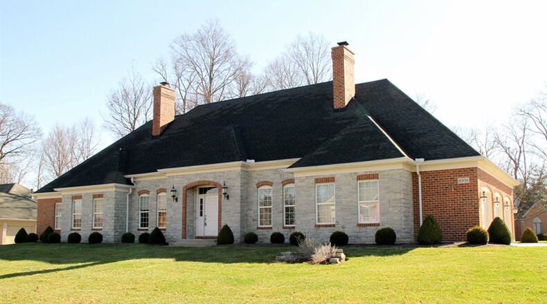 This home has about 3,040 sq. ft. of living space with 4 bedrooms, 3 bathrooms, 2 wood-burning fireplaces and an oversized, 3-car garage, all on a 0.47-acre, corner lot. CONTRIBUTED PHOTOS BY KATHY TYLER