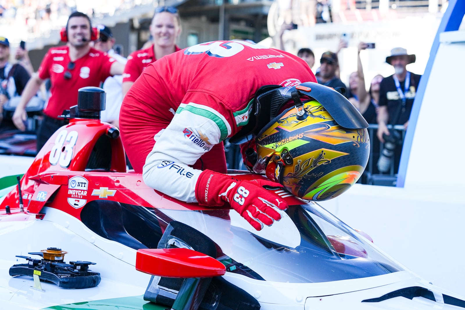 Robert Shwartzman, of Israel, celebrates after winning the pole position during qualifications for the Indianapolis 500 auto race at Indianapolis Motor Speedway in Indianapolis, Sunday, May 18, 2025. (AP Photo/Michael Conroy)