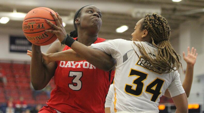 Dayton's Brittany Ward, left, is fouled by Virginia Commonwealth's Nyra Williams in the semifinals of the Atlantic 10 tournament on Saturday, March 9, 2019, at the A.J. Palumbo Center in Pittsburgh.