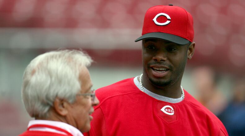 GREG LYNCH/Staff photo
Reds radio announcer Marty Brennaman talks to Reds outfielder Ken Griffey Jr. during batting practice prior to the Opening Day game against the Cubs Monday.