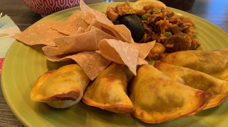 El Meson  chicken tortilla soup and beef empanadillas sold to-go in late March. CONTRIBUTED/ALEXIS LARSEN