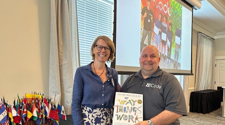 Doug Wurtzbacher (Right) owner of iCode after presentation about his business to the Centerville Rotary in 2024. He is shown with Rotary Past President Sofie Ameloot, CONTRIBUTED