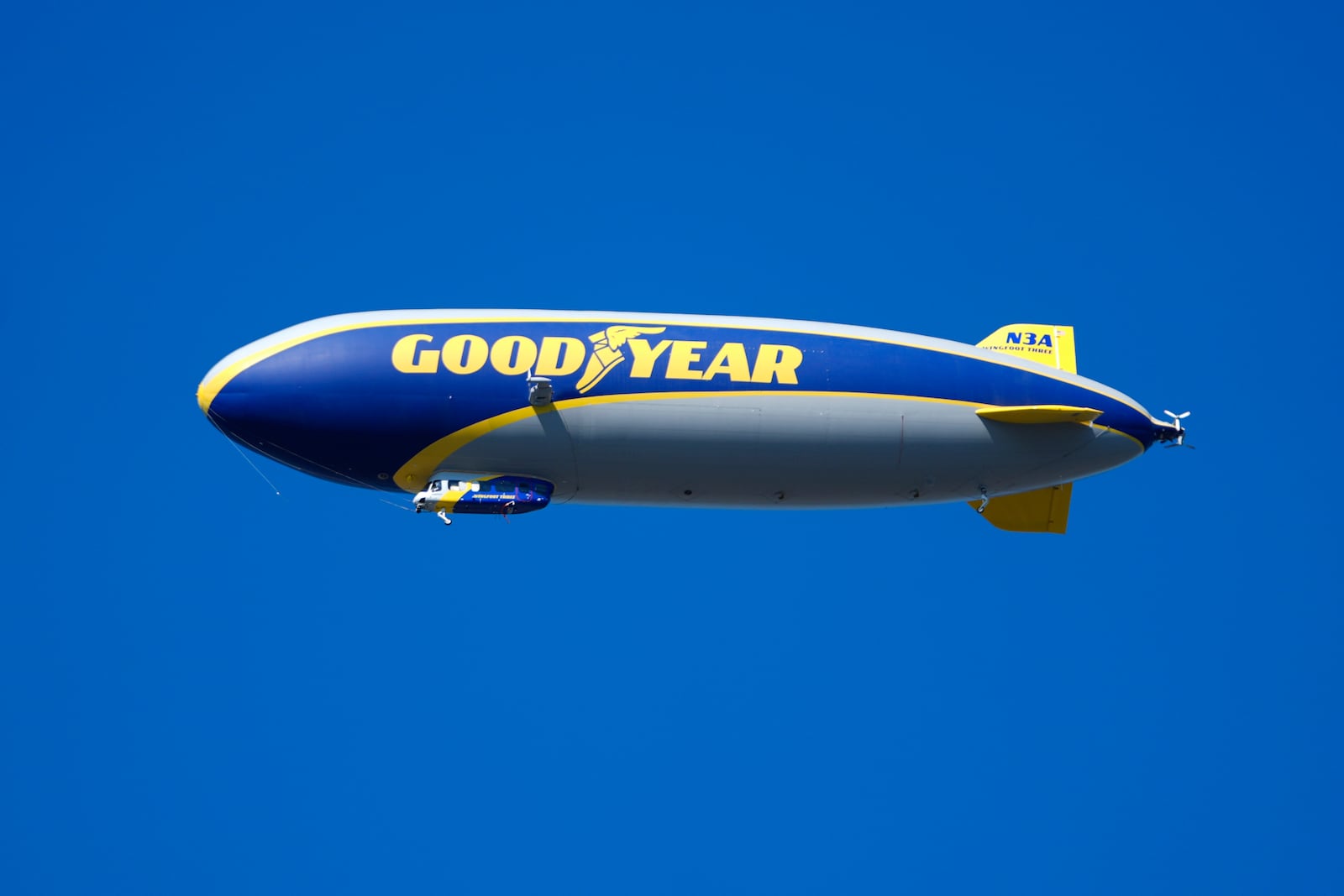 FILE - A Goodyear blimp flies over Michigan Stadium in the first half of an NCAA college football game between Michigan and Southern California in Ann Arbor, Mich., Saturday, Sept. 21, 2024. (AP Photo/Paul Sancya, File)