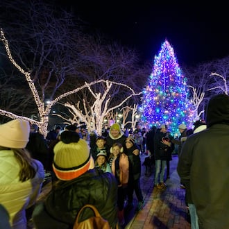 The Kettering Mayor’s Tree Lighting kicked off the city’s holiday season on Friday, Dec. 5, 2025, at Lincoln Park Civic Commons. Activities included Mayor Peggy Lehner’s Christmas tree lighting ceremony, photos with Santa Paws and Santa & Mrs. Claus, caroling by the Kettering Children’s Choir, horse-drawn carriage rides plus cookies and cocoa. TOM GILLIAM / CONTRIBUTING PHOTOGRAPHER