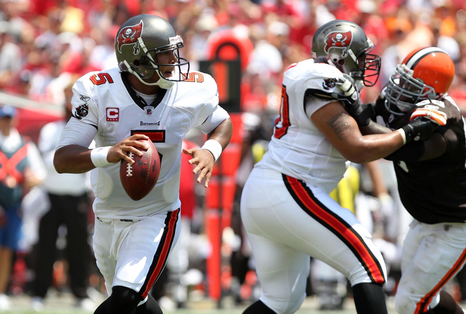 Bucs quarterback Josh Freeman (5) runs with the ball. Last season, he set Buccaneers rookie records for passing yards in a season (1,855) and touchdown passes in a season (10).