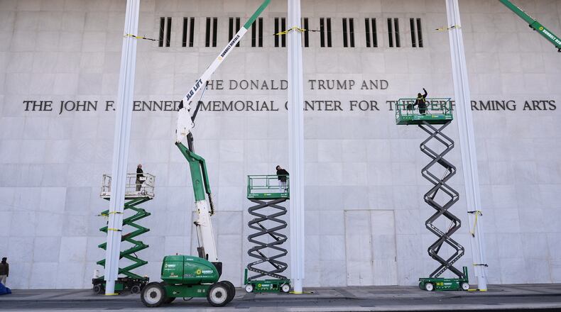 New signage, The Donald J. Trump and The John F. Kennedy Memorial Center For The Performing Arts, is unveiled on the Kennedy Center, Friday, Dec. 19, 2025, in Washington. (AP Photo/Jacquelyn Martin)