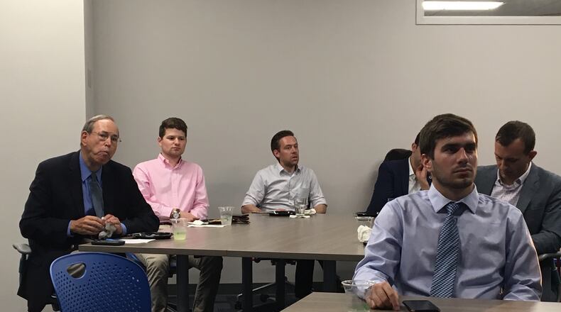 Former Ohio Gov. Bob Taft watches the first gubernatorial debate with University of Dayton students on Wednesday. The debate took place at UD.