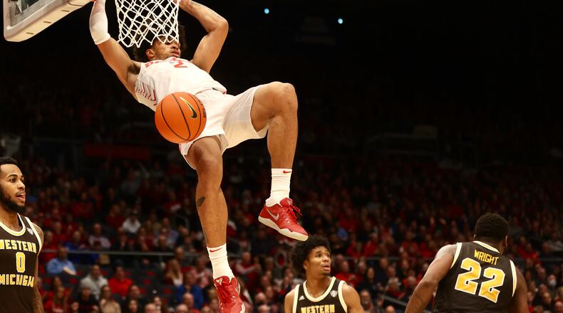 Dayton's Toumani Camara dunks against Western Michigan on Wednesday, Nov. 30, 2022, at UD Arena. David Jablonski/Staff