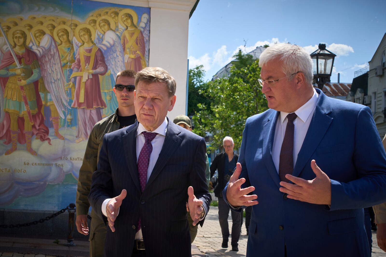 German Foreign Minister Johann Wadephul, left, and Ukrainian Foreign Minister Andrii Sybiha stand at the entrance of St. Michael Monastery in Kyiv, Ukraine, Monday, June 30, 2025. (AP Photo/Efrem Lukatsky)