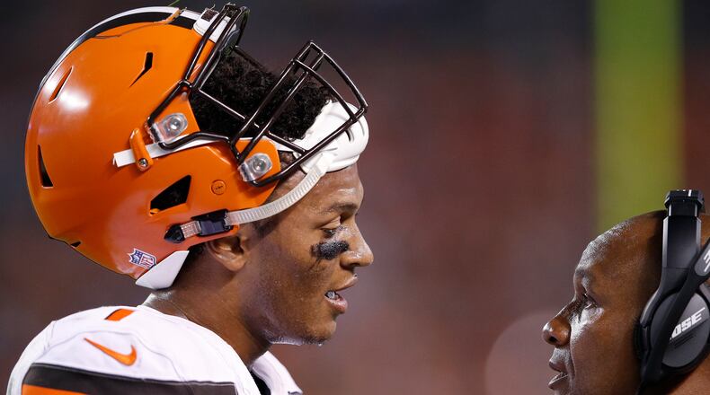 CLEVELAND, OH - AUGUST 21: DeShone Kizer #7 of the Cleveland Browns talks with head coach Hue Jackson in the second half of a preseason game against the New York Giants at FirstEnergy Stadium on August 21, 2017 in Cleveland, Ohio. (Photo by Joe Robbins/Getty Images)