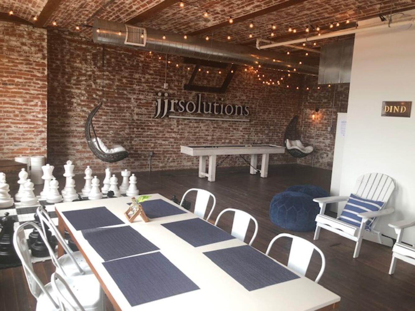 PHOTOS: Inside the new downtown Dayton office that has an industrial slide