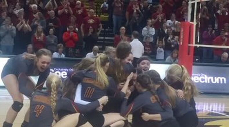 New Bremen players celebrate their state championship Saturday. DEBBIE JUNIEWICZ / CONTRIBUTED