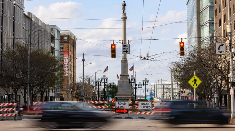 Main Street between Monument Avenue and First Street is closed for several weeks as crews update lighting. The city of Dayton is hoping to have the project complete by late May, in time for the NATO summit. BRYANT BILLING / STAFF
